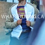 Clark Kent rips shirt open to reveal Superman suit