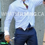 Tyler Hoechlin as Clark Kent with Superman suit peeking out of his shirt