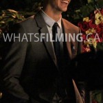 Grant Gustin smiling and laughing in between takes