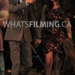 Barry and Iris holding hands as they walk while filming The Flash season 3 episode 3