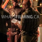 Grant Gustin and Director Kim Miles discussing the scene